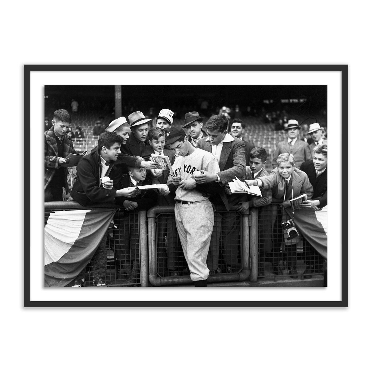 Joe Dimaggio Signing Autotgraphs By Getty Images