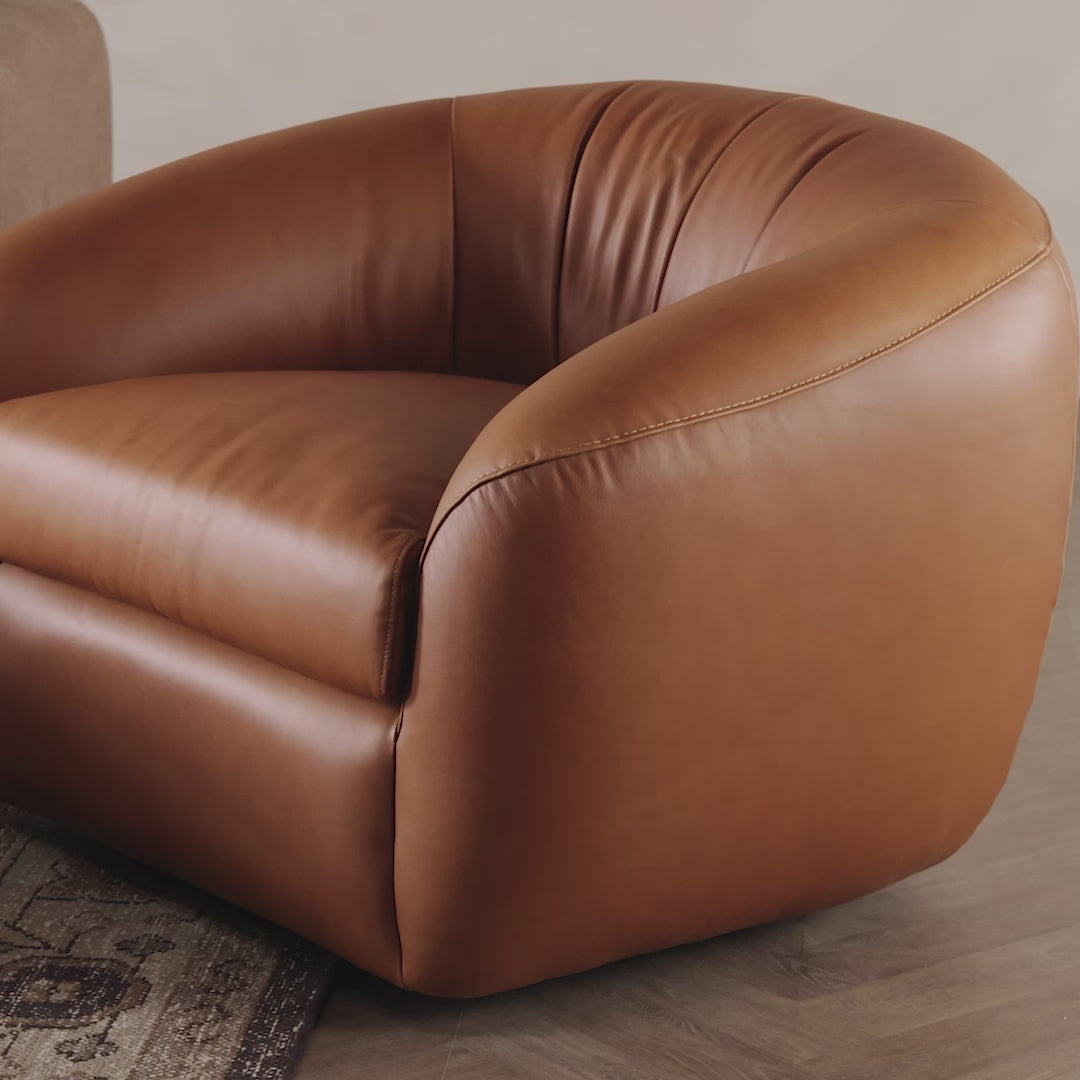 Load video: Saldana Swivel Chair